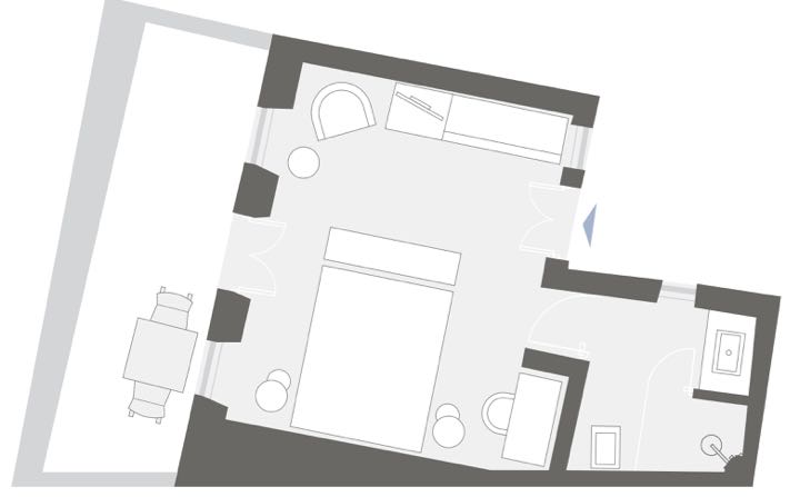 Disposición y dimensiones de la habitación en Grace Santorini.