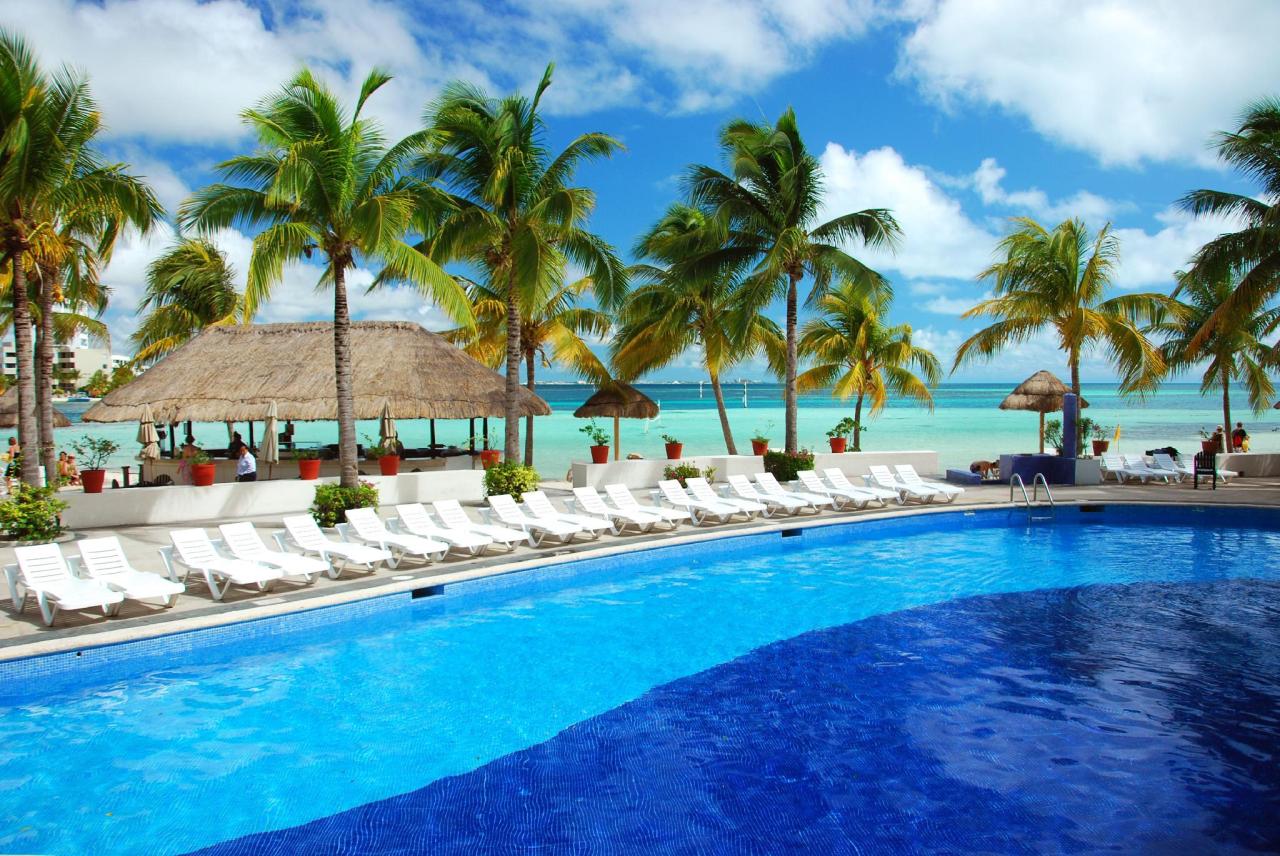 Piscina en el hotel oasis palms en Cancun